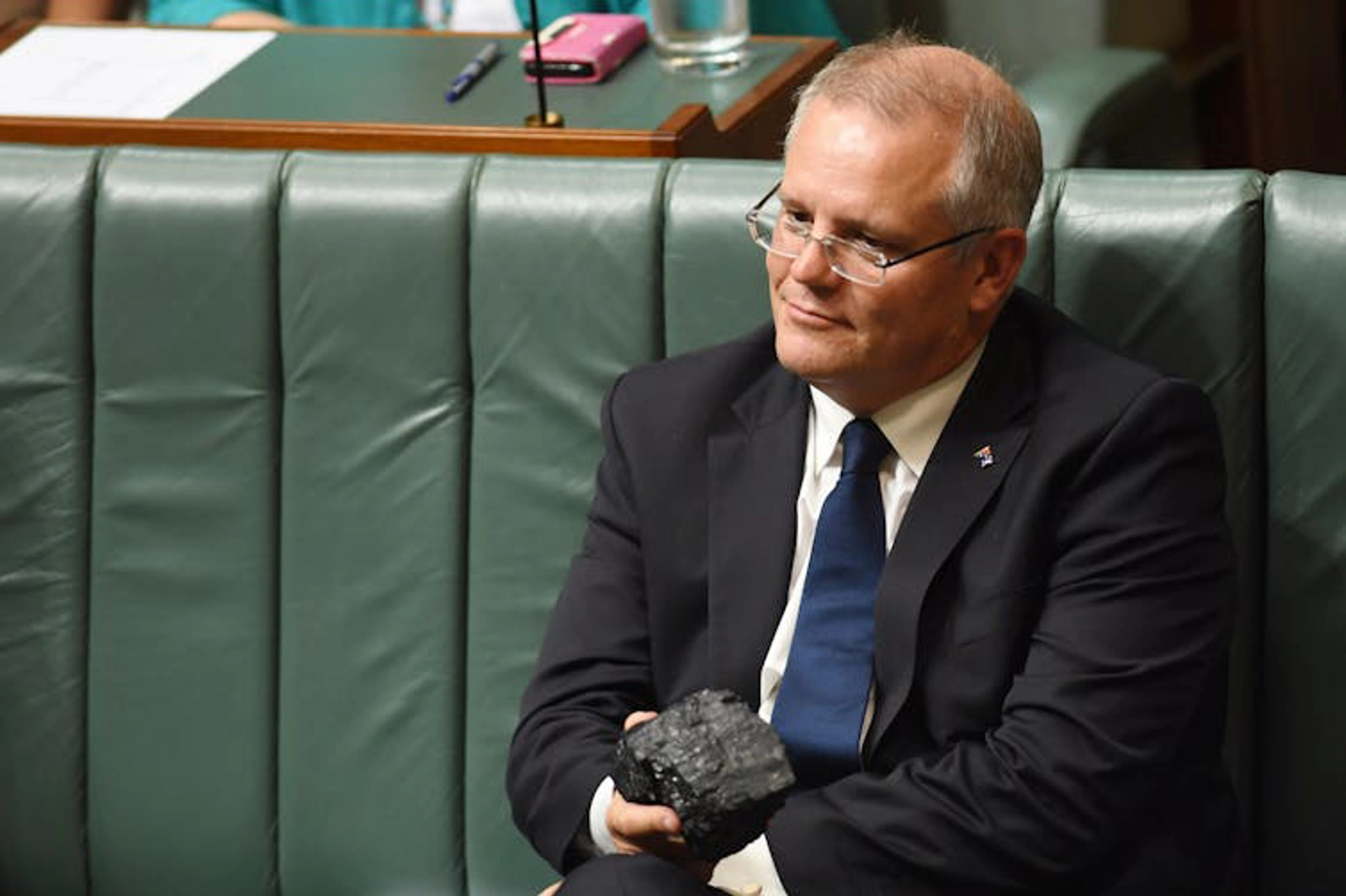 Scott Morrison, holding a lump of coal in Parliament, said SA’s renewables policy took the state back to the Dark Ages.