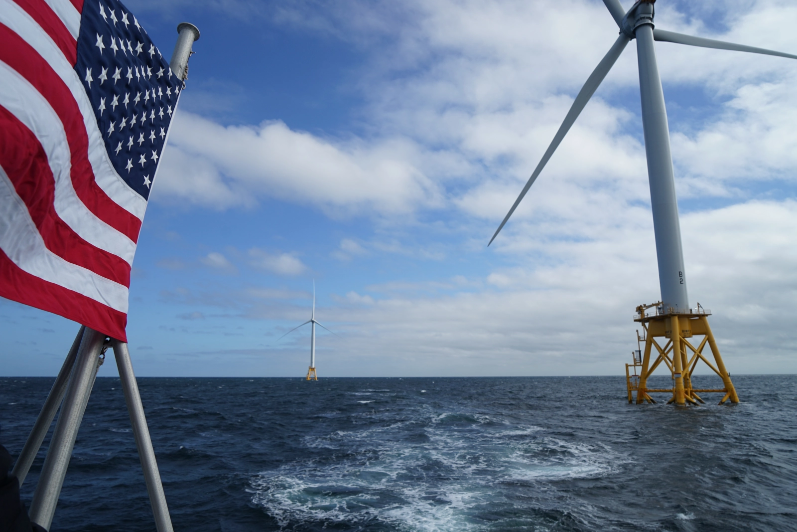 | Image: Block Island Wind Farm and American flag