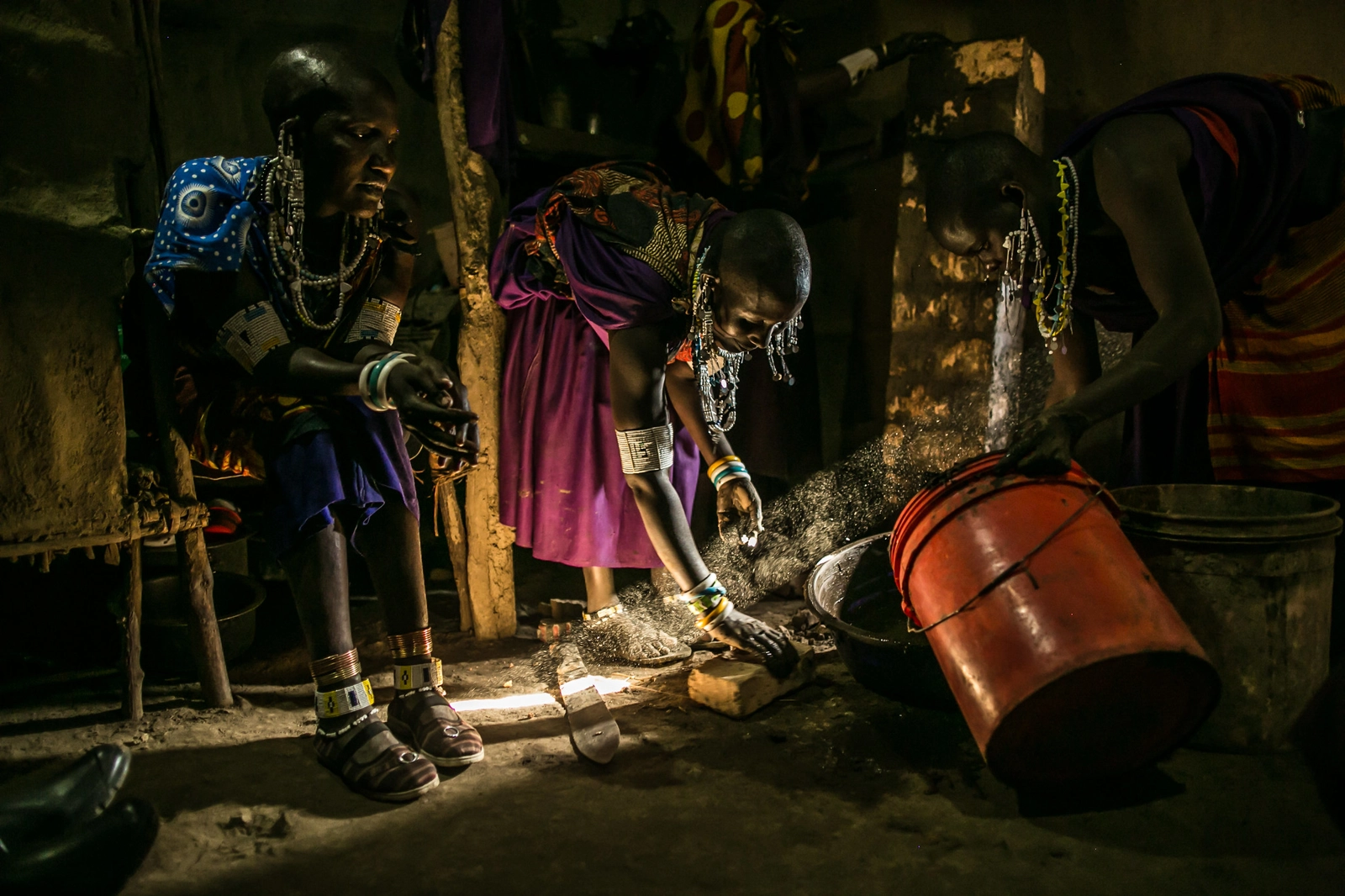 Through the creation of solar powered micro-grids, Maasai of the Moduli district in northern Tanzania are receiving power in their mud huts inside their bomas (corralled community). The solar power is providing life-saving water purification, a shared refrigerator for food and medicines, a computer for the community, and lights for the cow and goat corrals to frighten away the hyenas. The International Collaborative for Science, Education and the Environment (ICSEE) also manufactures and distributes a chimney stove for Maasai homes designed collaboratively with Maasai women and installed by teams of women from each participating village to reduce the intake of smoke and carbon dioxide when cooking over traditional fires inside the home. Footage by Morgana Wingard/ USAID.